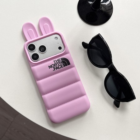 ノースフェイス風 iPhone17/17ProMax ダウンジャケット風ソフトシリコン耐衝撃ケース。The North Face iPhone16/16pro キツネ耳かわいいデザイン 女子高校生ブランド。iPhone15/15pro 大人可愛いケース。流行り・耐衝撃・防水。かわいい・格安。おすすめiPhone17ケース / 17プロプラスケース。